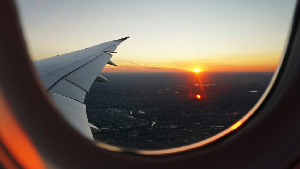 Airplane tail at an airport representing travel across the United States